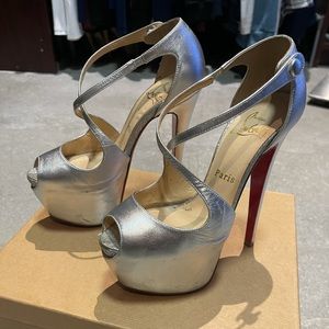 Christian louboutin platform heels 100% authentic.